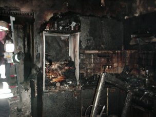 zerstörte Küche durch Feuer